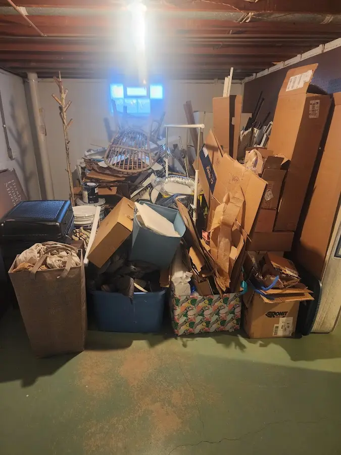 Roll-off dumpster container at job site for 4 Yard Dumpster Rental in Pittston